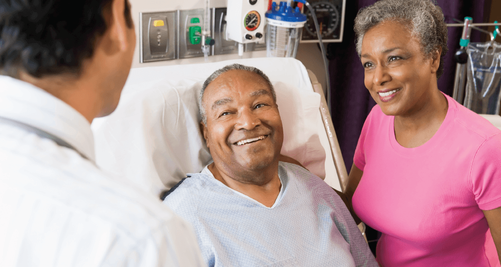 Senior Couple Talking with doctor