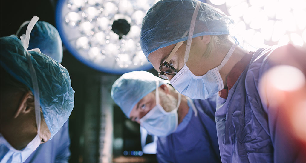 A team of surgeons in the operating room